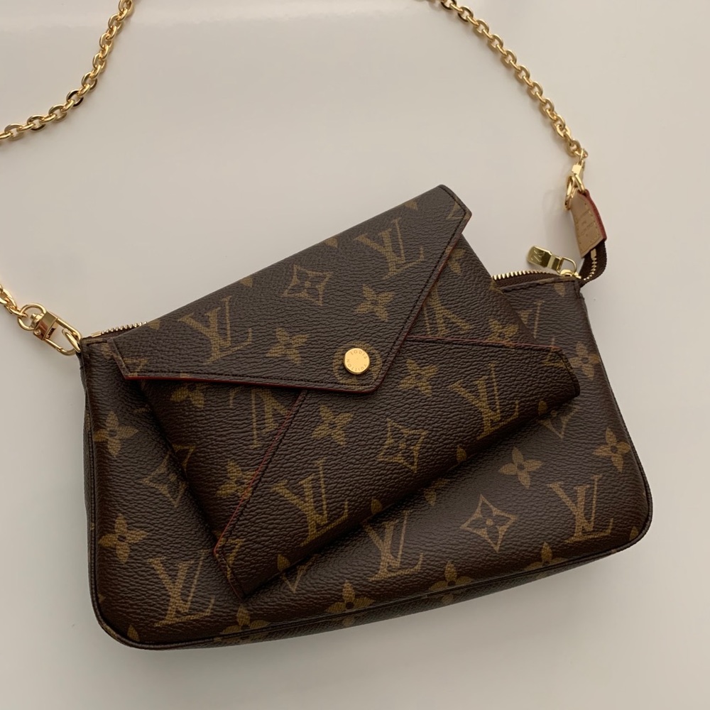 Sold.  Louis Vuitton Medium Kirigami